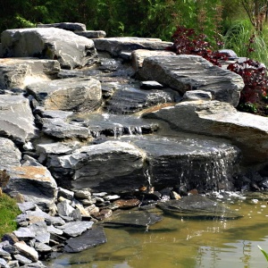 Minge Galabau Referenz Wasser im Garten 08